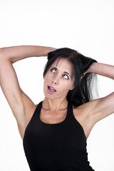 Fototapeta premium Woman with her hands in her hair