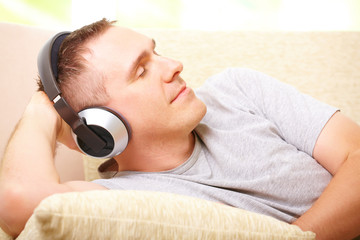 Man listening music with headphones