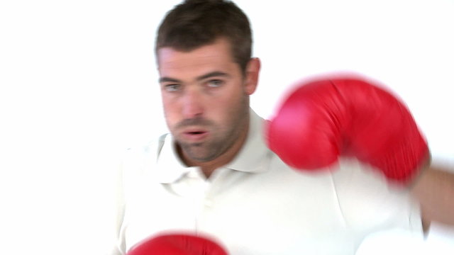 Charismatic man with boxing gloves