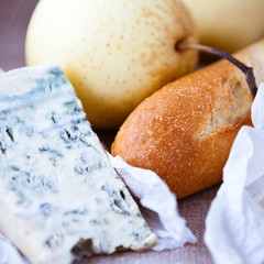 Closeup of baguette, blue cheese and parsley