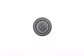 Old button isolated on white
