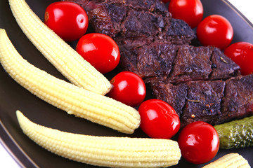 grilled beef with baby corns