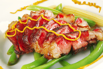 beef meat served with mustard