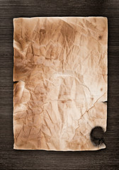 Old paper texture on wood