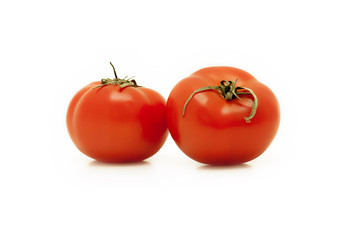 two red tomatoes on white background