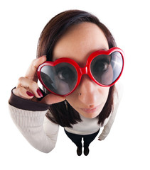 Fish-eyed girl with heart-shaped sunglasses