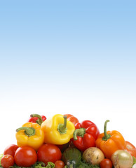 Fresh and tasty vegetables on a ligh blue gradient background