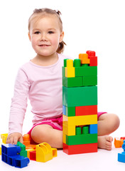 Little girl with building bricks
