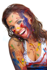 Naklejka premium Happy gir smeared in paint