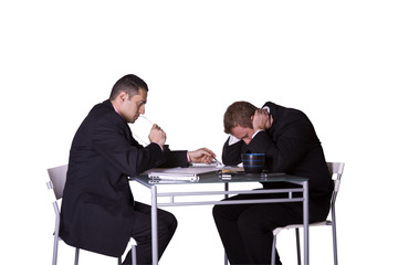 Stressed Businessmen Working Together to Meet the Deadline