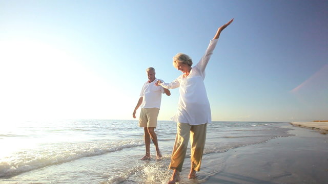 Older Couple Enjoying Life on the Beach