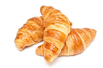 fresh croissants on white