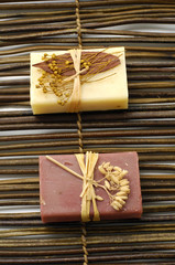 Two nature soap on bamboo mat