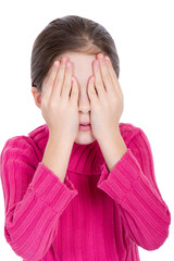 Young little girl covering eyes