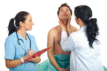 Doctor examine thyroid male patient