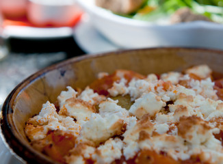 Greek food with cheese and tomato