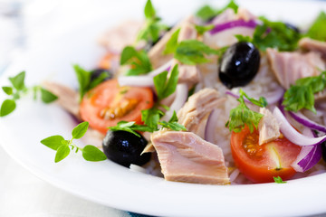 Closeup of tuna salad with fresh herbs