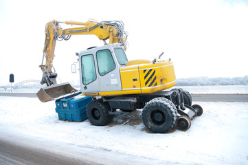 excavator in snow