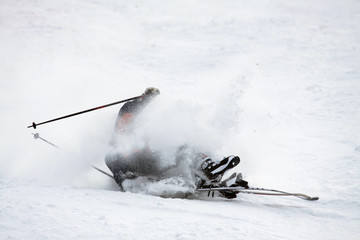 Falling skier.