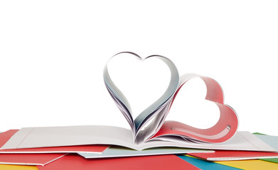 Opened book and heart shape