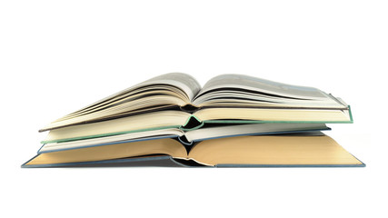 Pile of luxury bound open books isolated on white