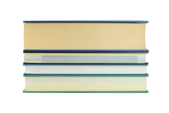 Pile of luxury bound books isolated on white