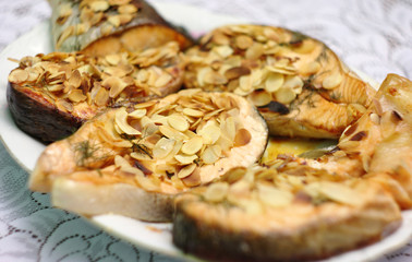 Baked salmon with almond flakes