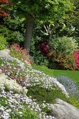 Beautiful rock garden in spring, also available in horizontal.