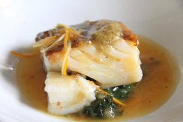 Cod fillet with vegetables and  sauce