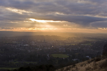 Stunning colorful sunset over countryside landscape