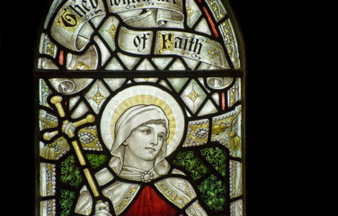 Fototapeta na wymiar Beautiful stained glass window detail in 15th Century Saxon chur