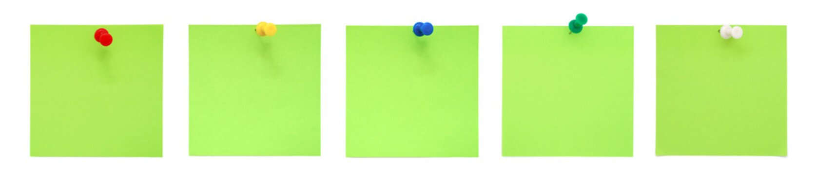 Green sticky notes with push pins