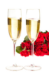 Valentine's day roses and champagne wine isolated on white