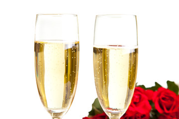 Valentine's day roses and champagne wine isolated on white