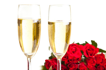 Valentine's day roses and champagne wine isolated on white