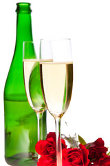 Valentine's day roses and champagne wine isolated on white