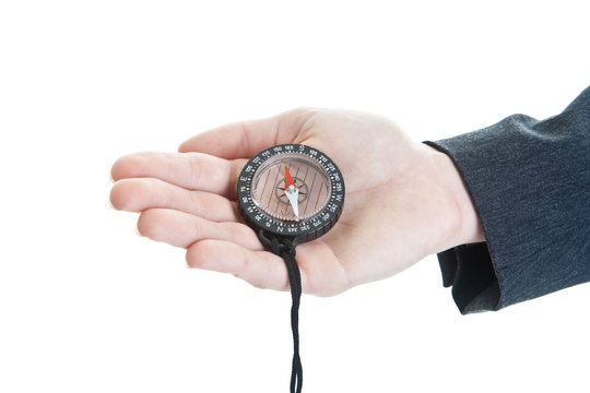 Caucasian Woman's Hand Holding Compass Isolated White Background