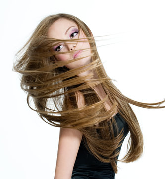 Teen Girl Shaking Head With Long Hair