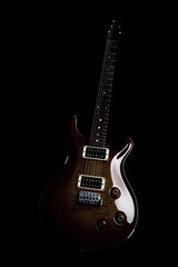 Electric guitar isolated on the black background