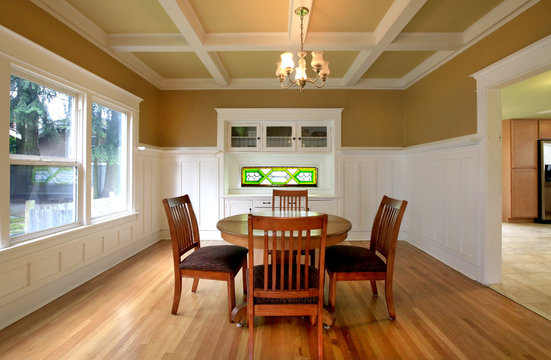 Dining room in a historical home with white molding