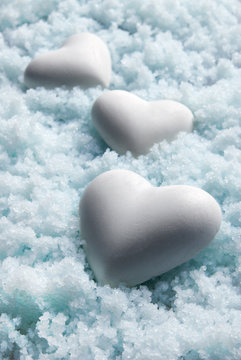 Blank white Hearts on Snow. Small DOF