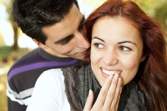 Wispering a naugthy secret