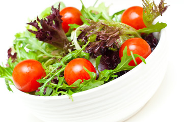 salad in a bowl on white