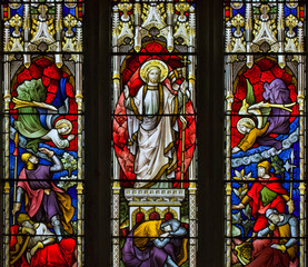Beautiful stained glass window detail with vibrant colors and ex