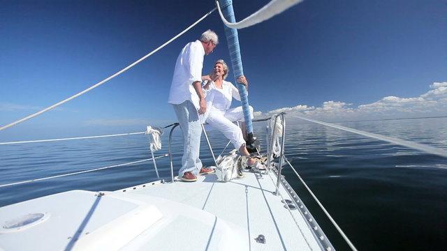 Retired Couple Enjoying Life Aboard a Luxury Yacht