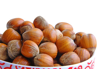 A bowl full of hazelnuts