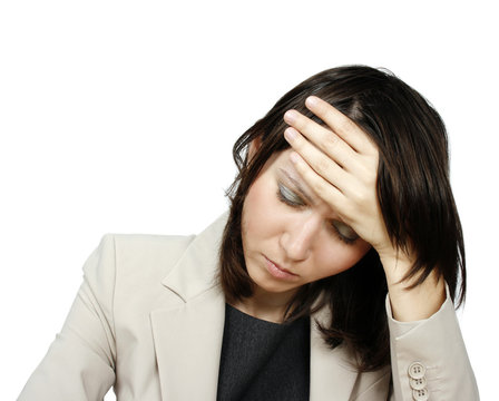 Young businesswoman with headache