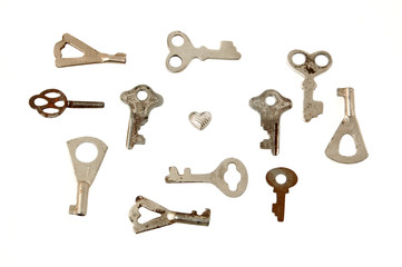 Key from smali heart, isolated on white background