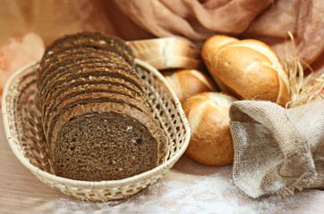 Fototapeta na wymiar assortment of baked bread on wood table
