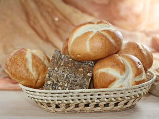 assortment of baked bread on wood table